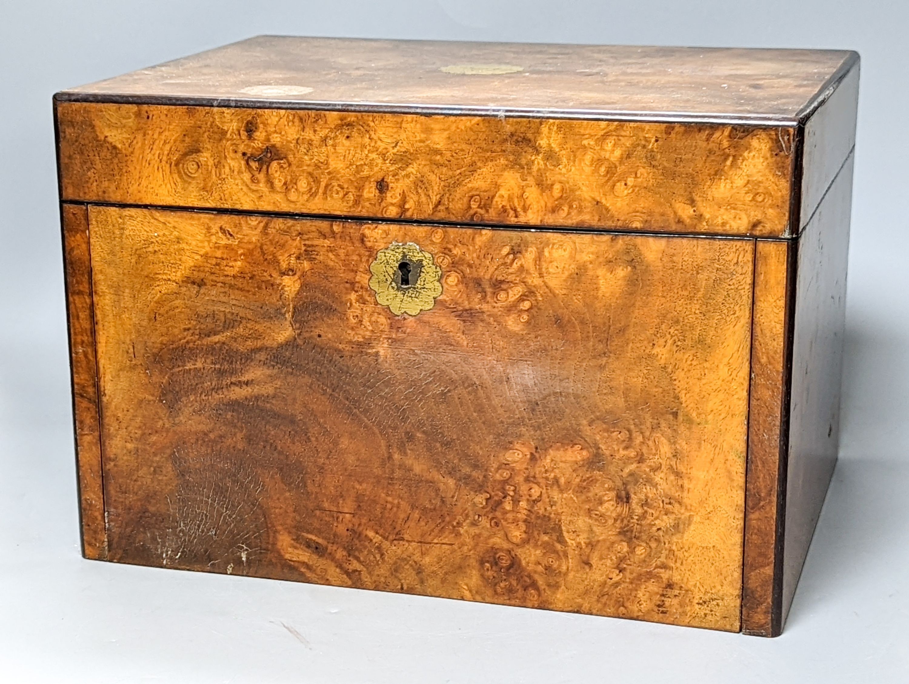 A Victorian walnut sewing casket, 34cm, containing sewing related accessories